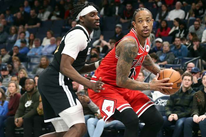 Chicago Bulls forward DeMar DeRozan (11) drives to the basket as Memphis Grizzlies guard Vince Williams Jr. (5) defends during the second half at FedExForum.